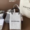Balenciaga Mini Tote Bag Limited Edition at Boutique, Featured by Entertainment Weekly - Stylish Black and White Design