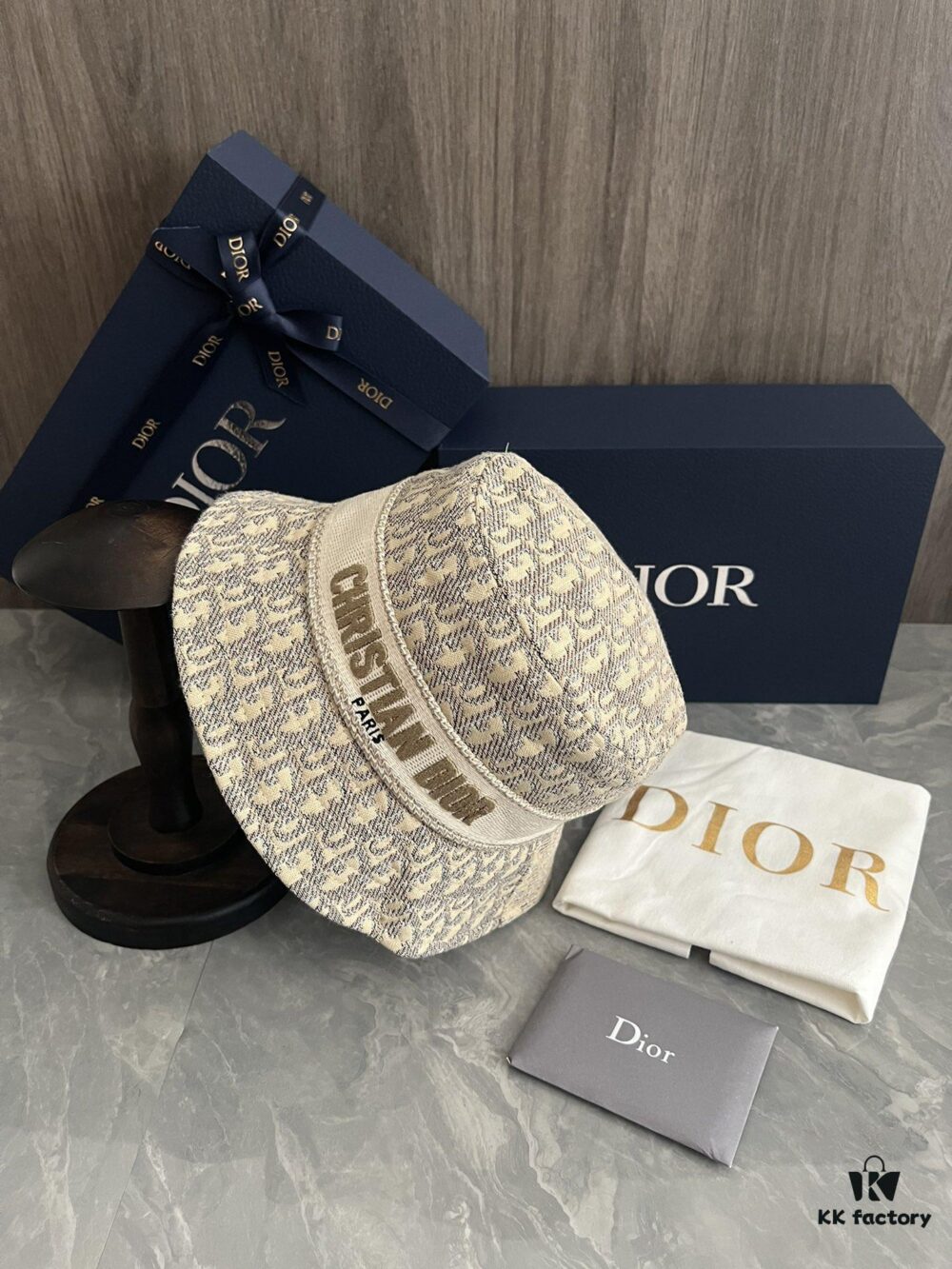 DIOR Bucket Hat, Ultra-Elegant with Deepened Silhouette Enhancing the Look, Featuring Contrasting Trim Embroidered with Bold 'Christian Dior Paris' Lettering