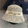 DIOR Bucket Hat, Ultra-Elegant with Deepened Silhouette Enhancing the Look, Featuring Contrasting Trim Embroidered with Bold 'Christian Dior Paris' Lettering