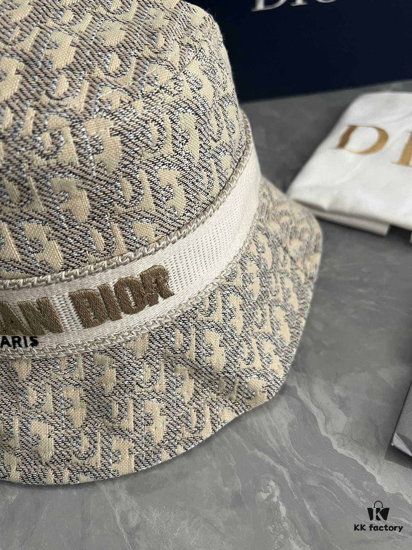 DIOR Bucket Hat, Ultra-Elegant with Deepened Silhouette Enhancing the Look, Featuring Contrasting Trim Embroidered with Bold 'Christian Dior Paris' Lettering
