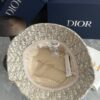 DIOR Bucket Hat, Ultra-Elegant with Deepened Silhouette Enhancing the Look, Featuring Contrasting Trim Embroidered with Bold 'Christian Dior Paris' Lettering