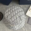 DIOR Bucket Hat for Men and Women, Deepened Design Exudes Elegance, Contrasting Trim with Bold 'Christian Dior Paris' Logo Embroidery