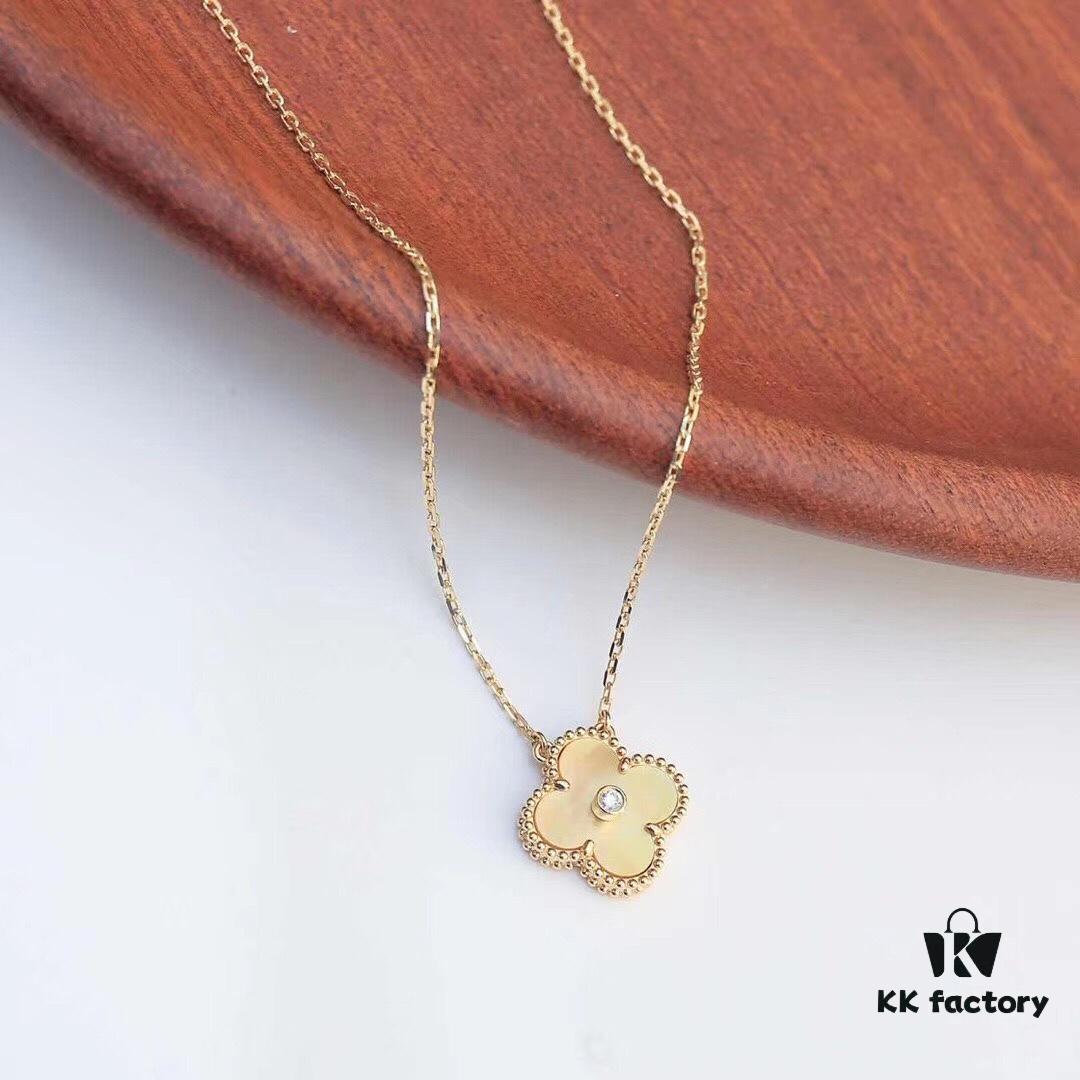 Van Cleef & Arpels Vintage Alhambra Christmas Collection, 18K Yellow Gold with Golden Mother-of-Pearl and Diamond Accent