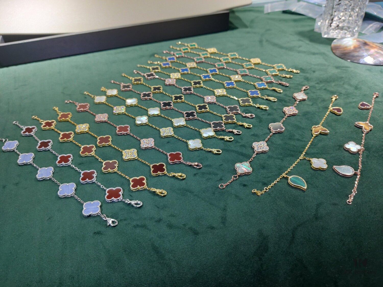 Van Cleef & Arpels VCA Five-Flower Bracelet, Authentic Design! The four-leaf mother-of-pearl motif features smooth, elegant lines with hand-polished small beads for a full, three-dimensional appearance. Custom lobster clasp with exclusive anti-counterfeit code—each bracelet carries a unique identification number, ensuring authenticity. Hand-engraved chain links, each with four faceted surfaces, showcase impeccable craftsmanship and refined elegance. Beautiful when worn alone or layered.