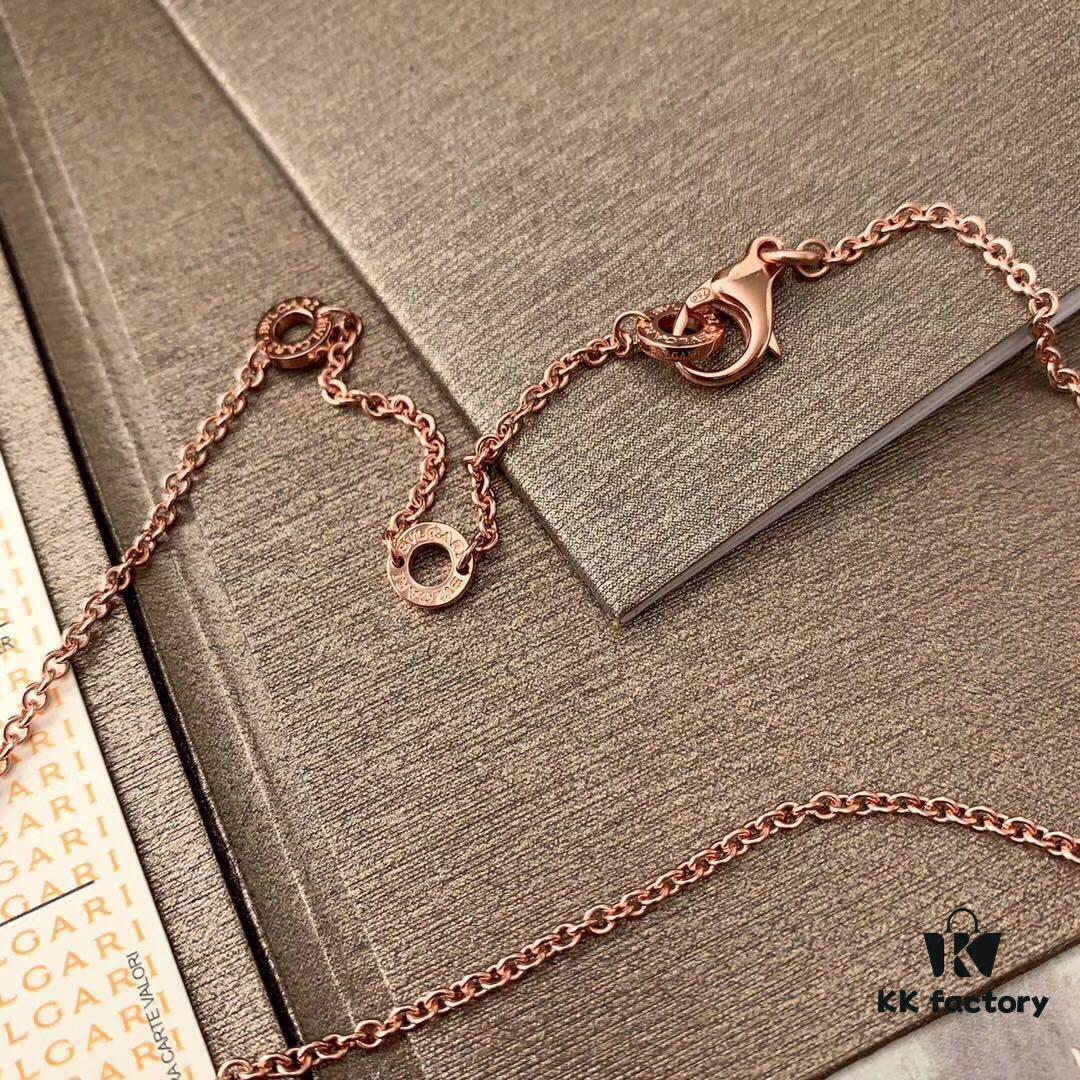 Exclusive In-Stock! White Ceramic Necklace Bvlgari B.ZERO1 Series Necklace with Rose Gold Chain Featuring Black Ceramic Spiral Pendant