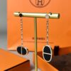 Hermes Chaine d'Ancre Verso Asymmetric Pig Nose Earrings in Yellow Gold, Rose Gold, and Black Ceramic