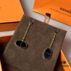 Hermes Chaine d'Ancre Verso Asymmetric Pig Nose Earrings in Yellow Gold, Rose Gold, and Black Ceramic