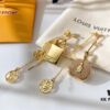 Louis Vuitton Boite Chapeau Bag in Monogram Canvas and Gold-Tone Metal, Adorning Mini LV Asymmetrical Earrings