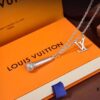 LV Microphone Necklace 🎤 Featuring the DJ-inspired design by former Men's Artistic Director Virgil Abloh, this pendant captures the essence of music culture with a finely etched microphone charm and delicately suspended LV initials on a sleek chain. Metal hardware, microphone-shaped pendant, LV letter detailing—perfect for gifting or personal wear!