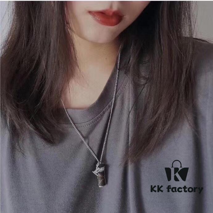 LV Perfume Bottle Necklace, Rotatable Design with Monogram Leather Accent, Unisex Fashion Pendant for Fragrance or Charms