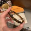 LV Monogram Canvas Leather and Calfskin Inlaid Bangle Bracelet