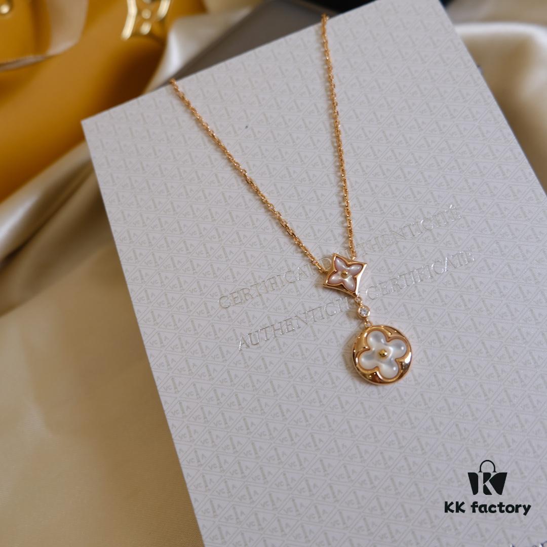 Exquisitely Crafted ZP LV Jewelry with Classic Floral Design, White Shell, Pink Rhombus Shell, and Accented with a Small Diamond