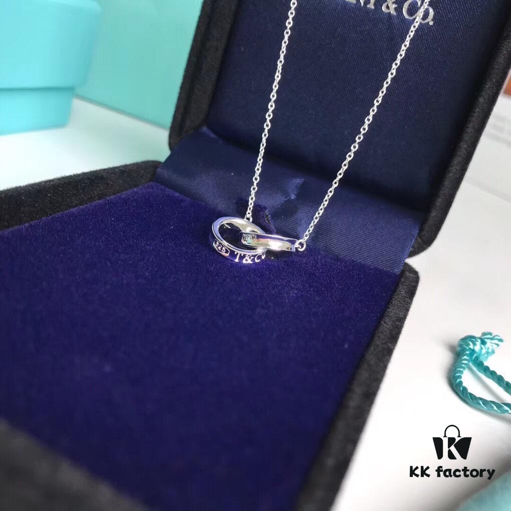 Tiffany & Co. T1837 Double Ring Necklace with Toggle Closure, Fashionable Silver Pendant Inspired by the Brand's Founding Year