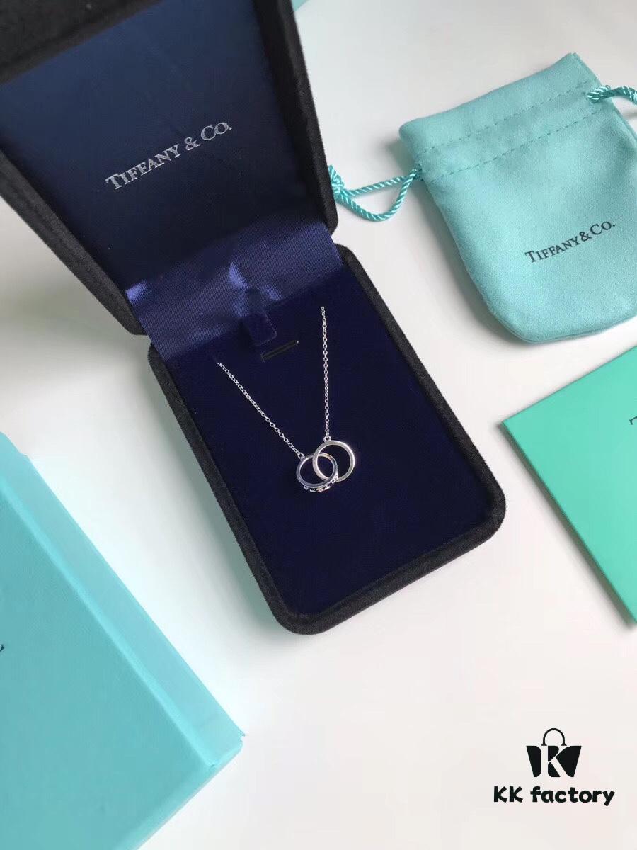 Tiffany & Co. T1837 Double Ring Necklace with Toggle Closure, Fashionable Silver Pendant Inspired by the Brand's Founding Year
