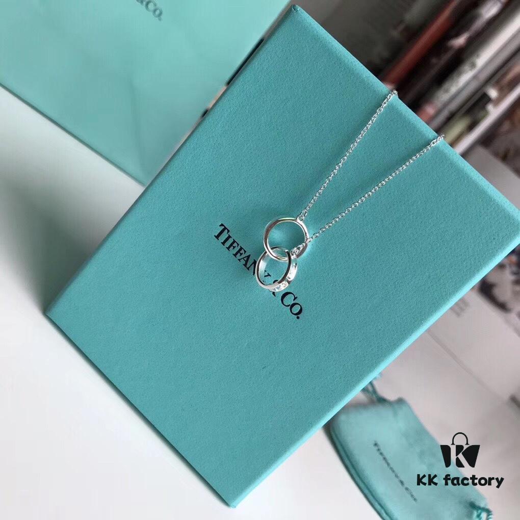 Tiffany & Co. T1837 Double Ring Necklace with Toggle Closure, Fashionable Silver Pendant Inspired by the Brand's Founding Year