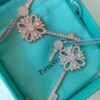 Tiffany & Co. Classic Double Key Snowflake Sweater Chain with Small Yellow Diamond Accents, Featuring Elegant Logo, Available in White Gold and Rose Gold