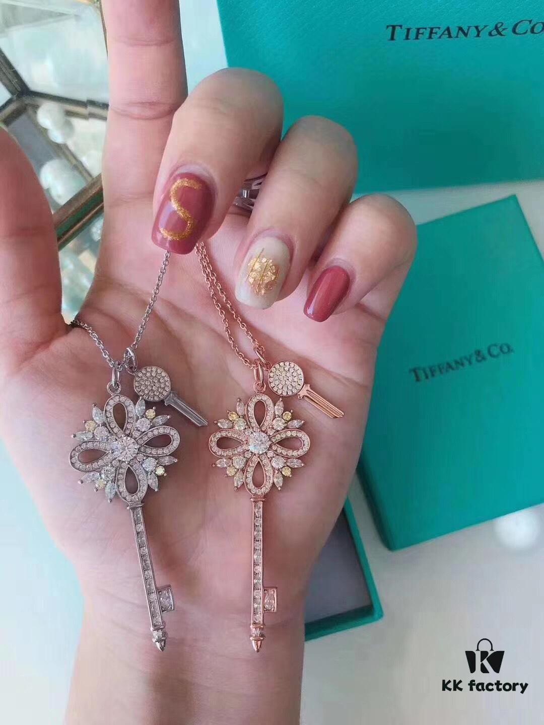 Tiffany & Co. Classic Double Key Snowflake Sweater Chain with Small Yellow Diamond Accents, Featuring Elegant Logo, Available in White Gold and Rose Gold