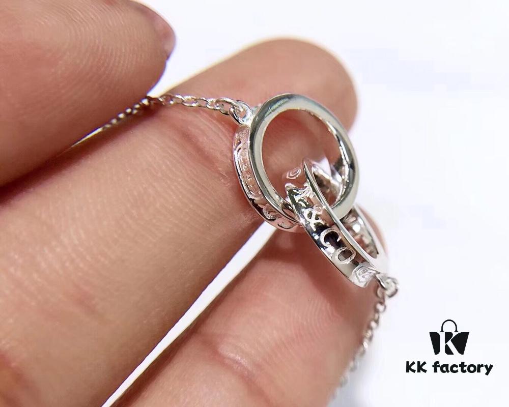 Tiffany Double Ring Necklace with Dual Hoop Pendant Featuring Engraved Founding Year