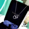 Tiffany Double Ring Necklace with Dual Hoop Pendant Featuring Engraved Founding Year