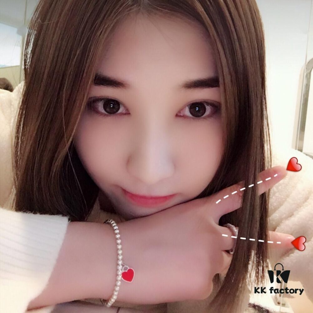 Woman Wearing Tiffany Heart Bracelet