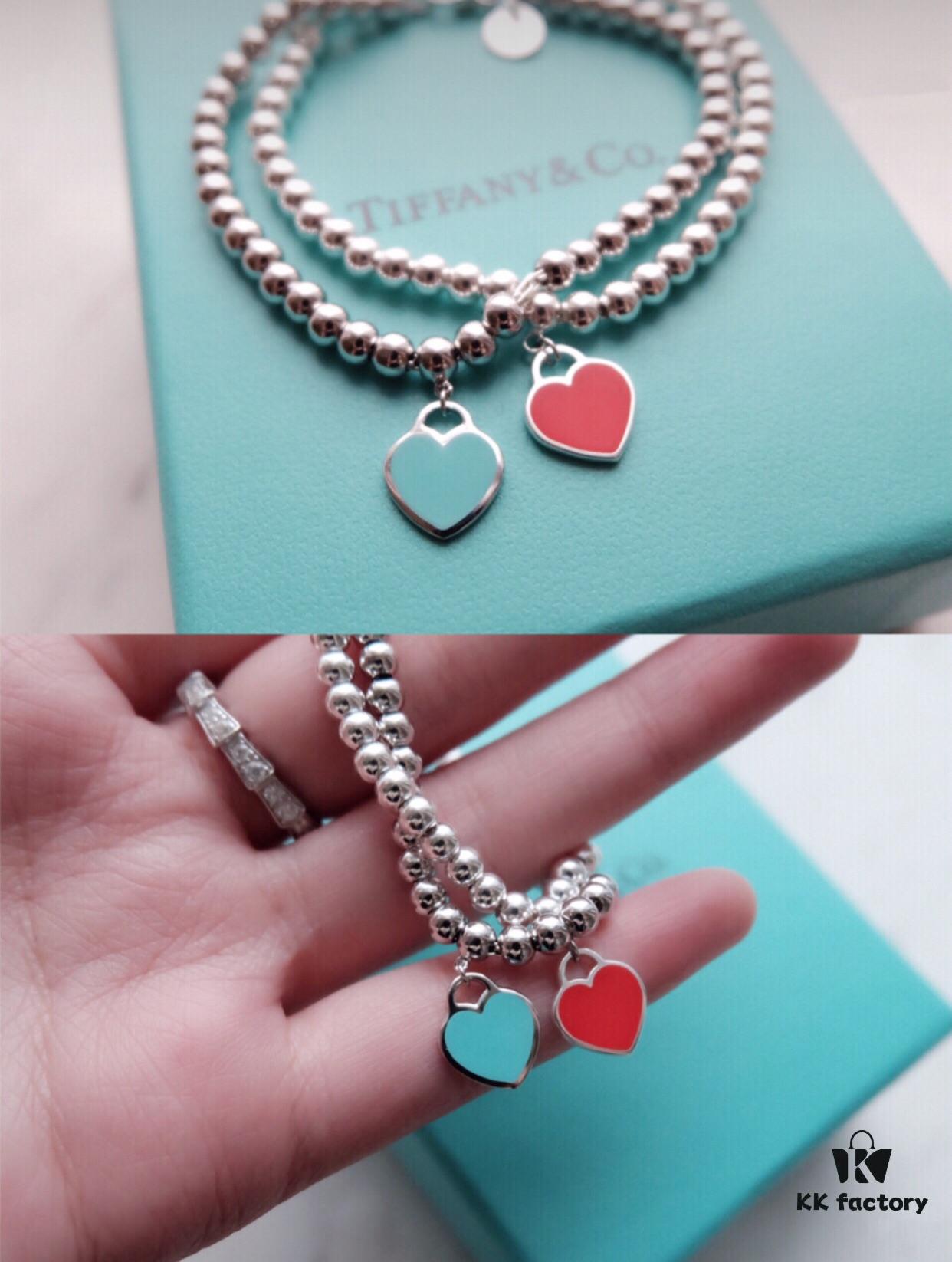 Woman Wearing Tiffany Heart Bracelet