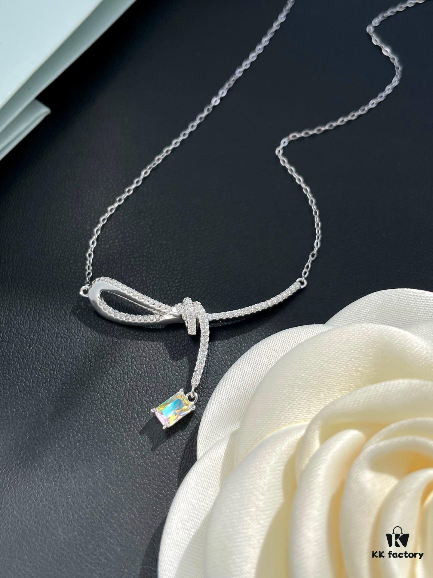He Fang Aurora Ribbon Knot Collarbone Necklace, Exquisitely Crafted from S925 Silver with Shimmering Diamond Accents and Colorful Iridescent Cube Pendant