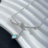 He Fang Aurora Ribbon Knot Collarbone Necklace, Exquisitely Crafted from S925 Silver with Shimmering Diamond Accents and Colorful Iridescent Cube Pendant