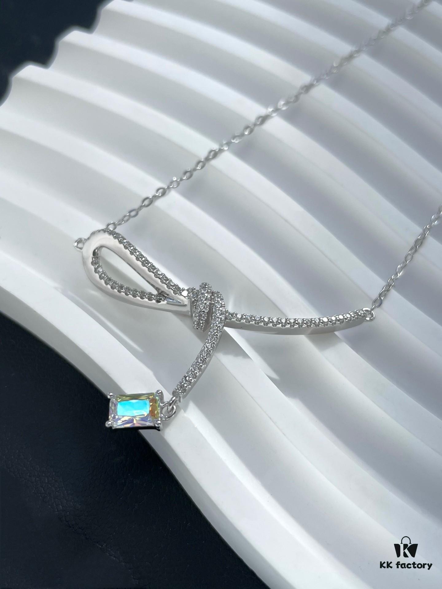 He Fang Aurora Ribbon Knot Collarbone Necklace, Exquisitely Crafted from S925 Silver with Shimmering Diamond Accents and Colorful Iridescent Cube Pendant