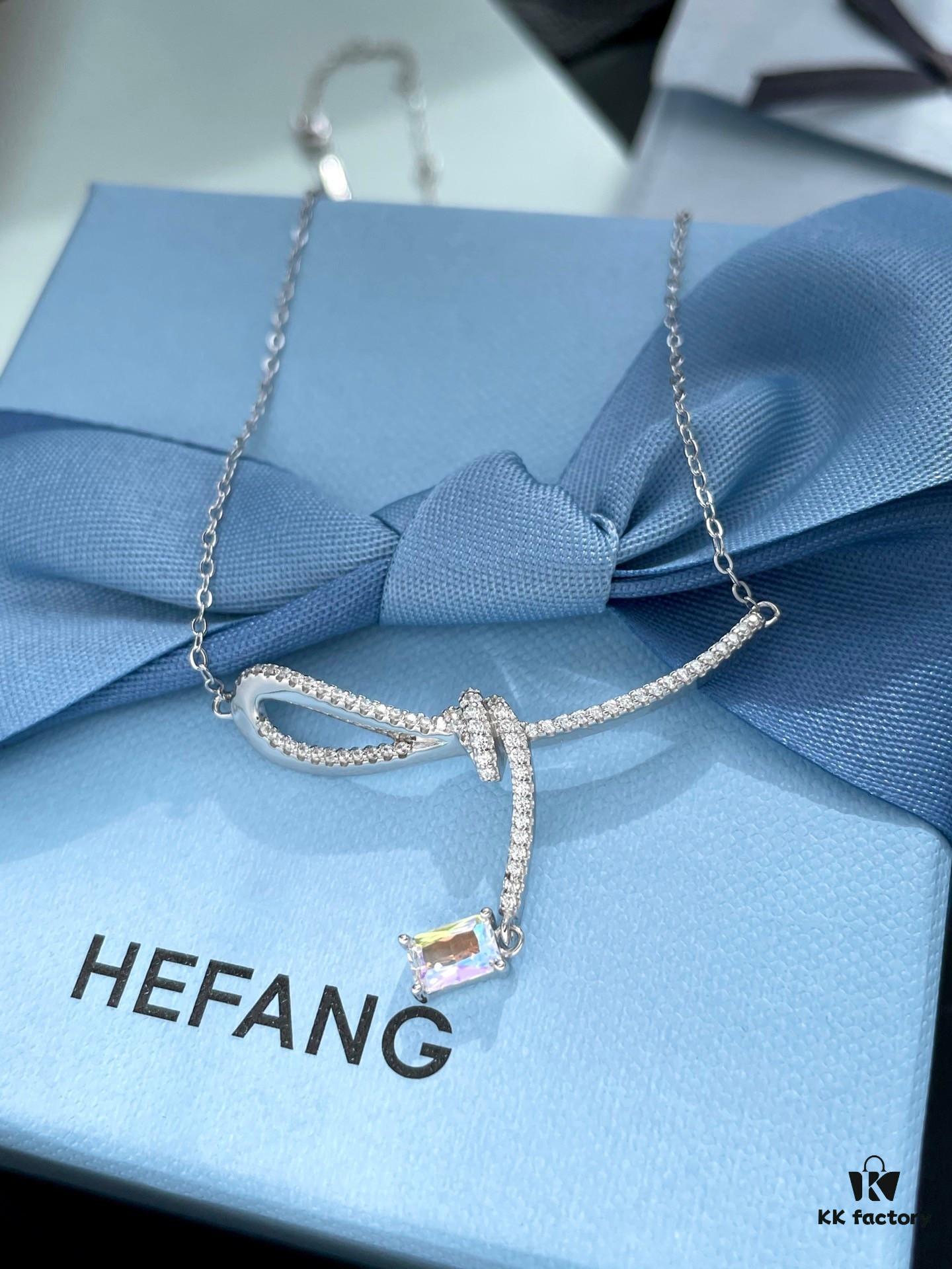 He Fang Aurora Ribbon Knot Collarbone Necklace, Exquisitely Crafted from S925 Silver with Shimmering Diamond Accents and Colorful Iridescent Cube Pendant