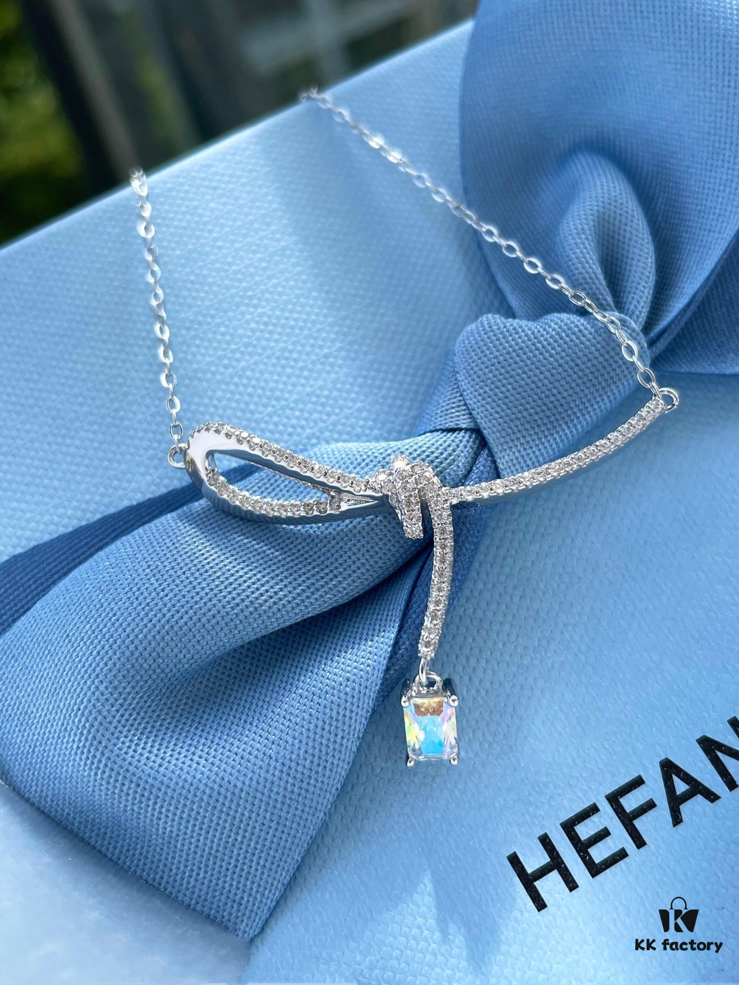 He Fang Aurora Ribbon Knot Collarbone Necklace, Exquisitely Crafted from S925 Silver with Shimmering Diamond Accents and Colorful Iridescent Cube Pendant