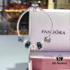 Pandora Night Sky Blue Elegant Pink Flower Design! Crafted with authentic boutique materials, perfectly replicating the original store quality. Features night sky blue bubbled glass, delicate cherry blossom spacers, cross snowflake charm, elegant pink flower accent, and is made of S925 silver, complete with official boutique packaging!