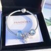 Pandora Icy Blue Bubble Sparkling Diamond Daisy New Arrival! Made with counter-grade materials, perfectly crafted to match the original quality. Featuring icy blue bubble glass, icy blue cat's eye, sparkling diamond daisy, and S925 silver, complete with official packaging!