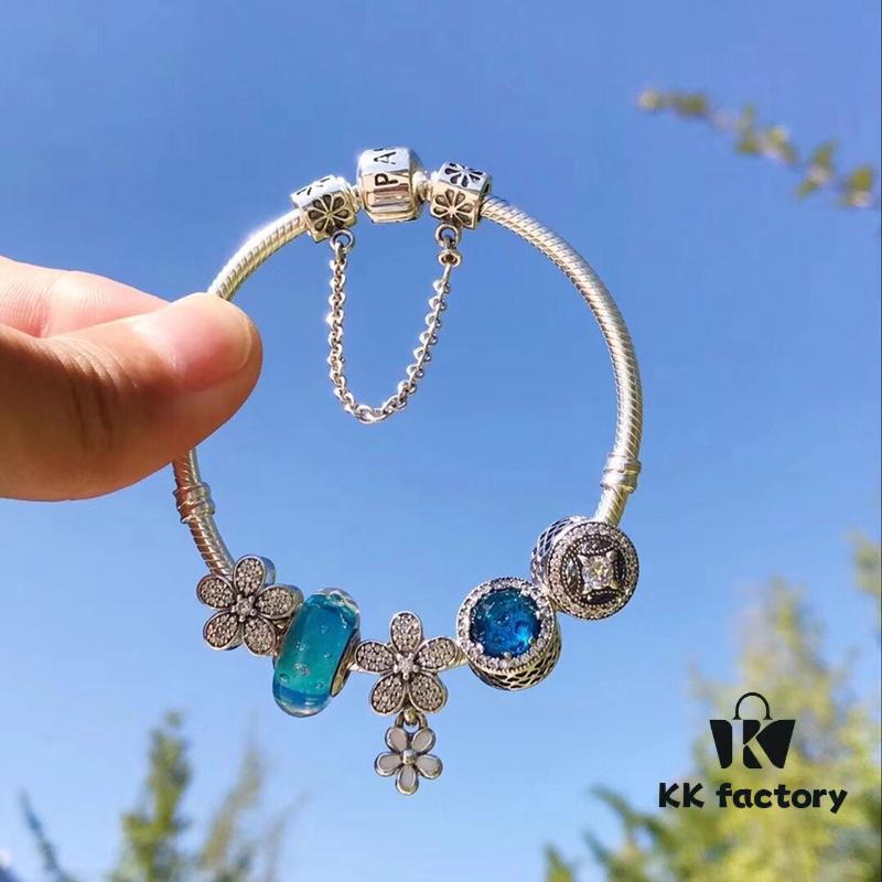 Pandora Lake Blue Bubble Daisy Flower Blossom 🌼 New Arrival! Made with authentic boutique materials, perfectly crafted to match retail quality! Featuring vibrant lake blue bubble glass, sparkling ocean blue cat's eye stone, lucky coin charm, fully diamond-set daisy flower and daisy safety chain, paired with a diamond-encrusted daisy pendant. Crafted in S925 sterling silver, complete with official boutique packaging!