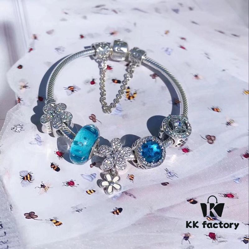 Pandora Lake Blue Bubble Daisy Flower Blossom 🌼 New Arrival! Made with authentic boutique materials, perfectly crafted to match retail quality! Featuring vibrant lake blue bubble glass, sparkling ocean blue cat's eye stone, lucky coin charm, fully diamond-set daisy flower and daisy safety chain, paired with a diamond-encrusted daisy pendant. Crafted in S925 sterling silver, complete with official boutique packaging!