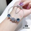 Pandora Pandora's Starry Sky Horizon New Arrival Elegant Dark Blue Flash Diamond Cat Eye Bracelet with Lucky Coin Charm and Heart Safety Chain in S925 Silver