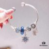 Pandora Pandora Shimmering Blue Snowflake ❄️ New Arrival! Perfectly crafted with counter materials, one-to-one replication, quality comparable to official store products! Featuring faceted shimmering blue glass, sparkling diamond-cut beads, openwork star and moon design, symbolic dream-catcher pendant, blue snowflake ❄️ charm. Comes with original counter packaging!