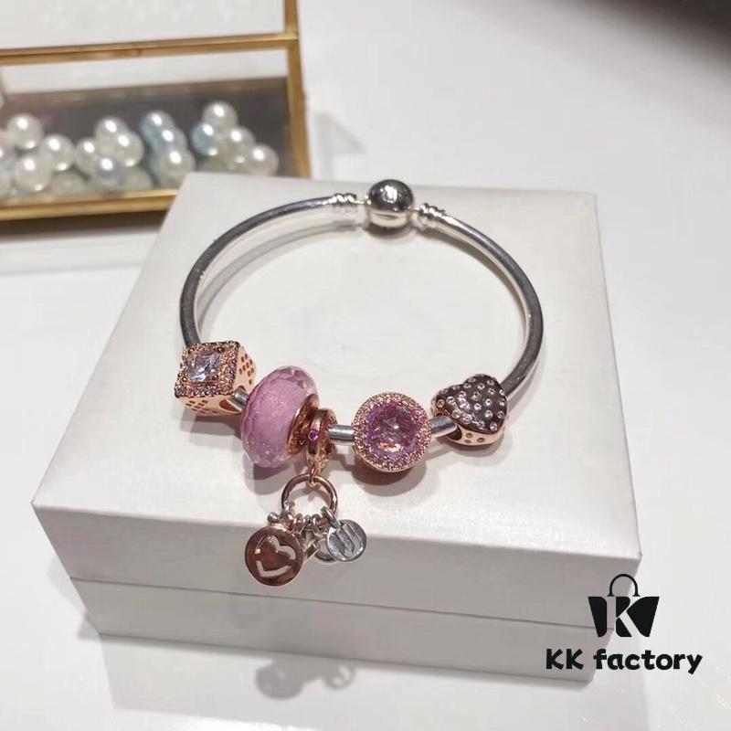 Pandora Rose Pink Love New Arrival! Made with authentic boutique materials, perfectly crafted 1:1, quality comparable to official retail. Features rose pink faceted crystal, rose shimmer lavender cat's eye stone, rose shimmer square zircon beads, rose indirect shimmer heart charm paired with 'Rose I Love You' pendant. Includes S925 silver and official boutique packaging!