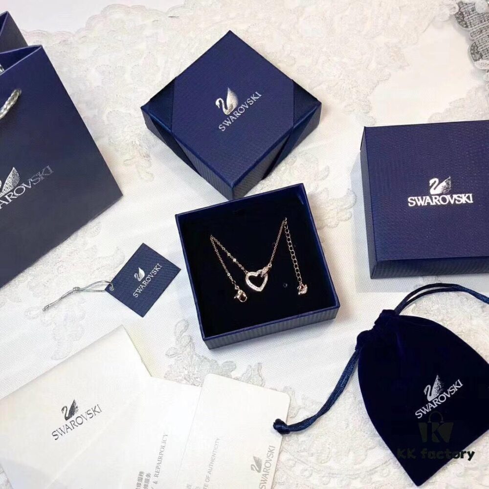 Swarovski 2018 Lovely Romantic Heart Necklace for Women, Gift for Girlfriend, Elegant and Fresh Design with Knot-Shaped Heart Symbolizing a Unique Bond, Sparkling Golden-Tone Plating with Transparent Pavé Crystals, Perfect for Daily Wear and an Ideal Gift of Love