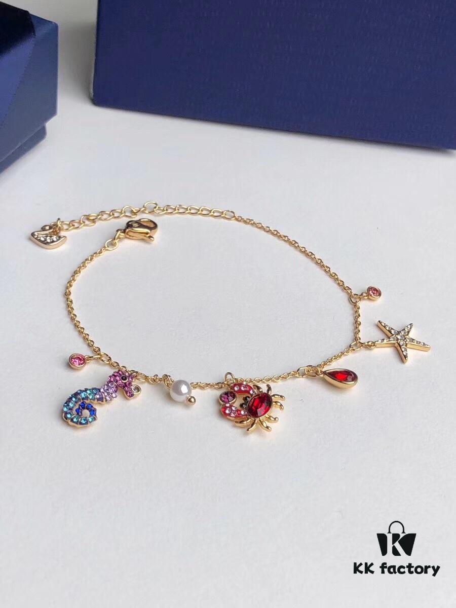 Swarovski OCEAN Marine Life Bicolor Colorful Bracelet for Women, Golden Chain with Gradient Seahorse, Crab Charm and Starfish Detail, Adjustable Fit, Perfect Gift for Her