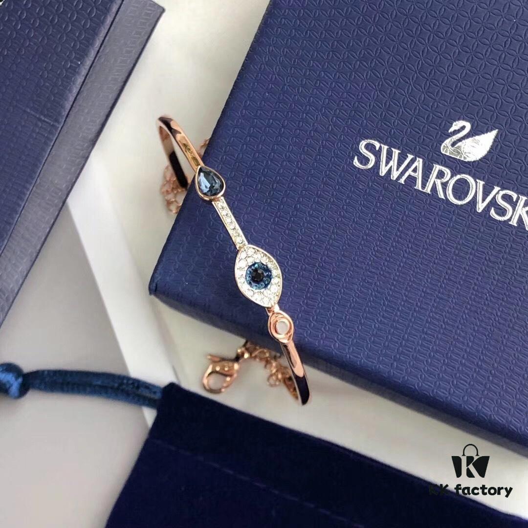 Swarovski Demon Bracelet, Classic Best-Selling Design with Black, Blue, and White Crystals Encircling Gracefully, Evoking the Mystical Potion of the Demon's Eye That Opens the Door to Luck and Lifelong Blessings! Elegant 18K Rose Gold-Plated Alloy with Vacuum Plating Paired with Black, Blue, and White Swarovski Crystals. One Size Fits All with Full Original Retail Packaging!