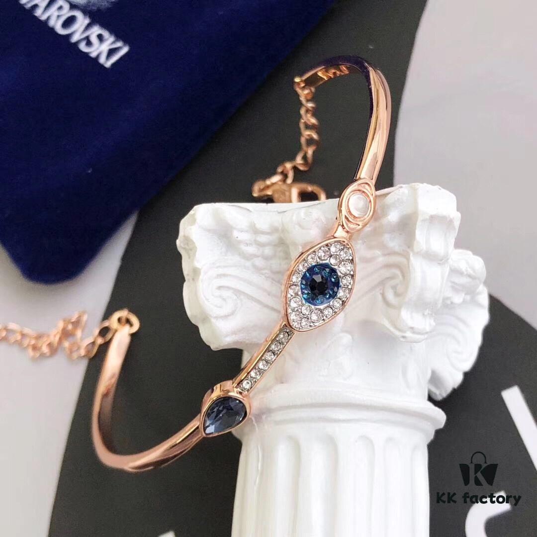 Swarovski Demon Bracelet, Classic Best-Selling Design with Black, Blue, and White Crystals Encircling Gracefully, Evoking the Mystical Potion of the Demon's Eye That Opens the Door to Luck and Lifelong Blessings! Elegant 18K Rose Gold-Plated Alloy with Vacuum Plating Paired with Black, Blue, and White Swarovski Crystals. One Size Fits All with Full Original Retail Packaging!