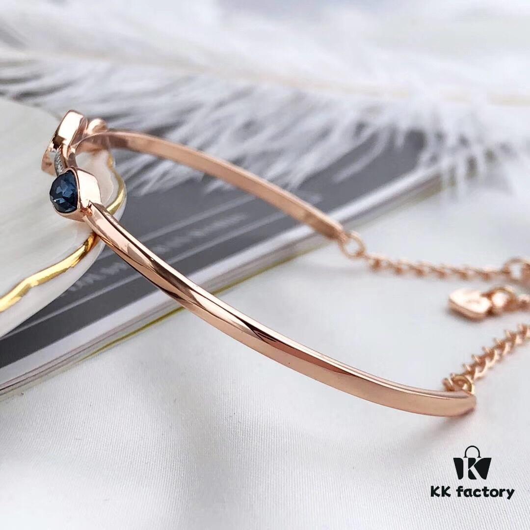 Swarovski Demon Bracelet, Classic Best-Selling Design with Black, Blue, and White Crystals Encircling Gracefully, Evoking the Mystical Potion of the Demon's Eye That Opens the Door to Luck and Lifelong Blessings! Elegant 18K Rose Gold-Plated Alloy with Vacuum Plating Paired with Black, Blue, and White Swarovski Crystals. One Size Fits All with Full Original Retail Packaging!