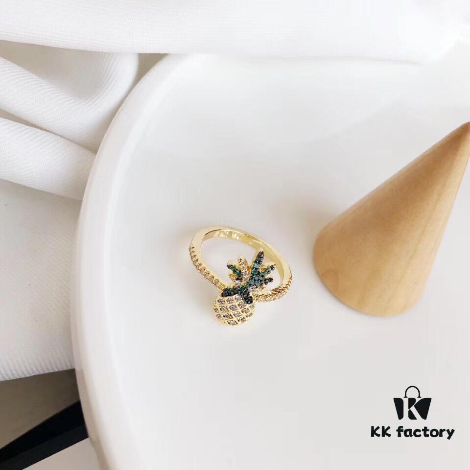 APM Monaco Pineapple Ring! Sparkling colorful crystals paired with various summer-inspired fruits and elements, creating a playful melody that adds a refreshing touch to your summer