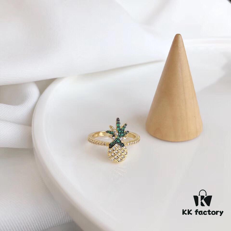 APM Monaco Pineapple Ring! Sparkling colorful crystals paired with various summer-inspired fruits and elements, creating a playful melody that adds a refreshing touch to your summer