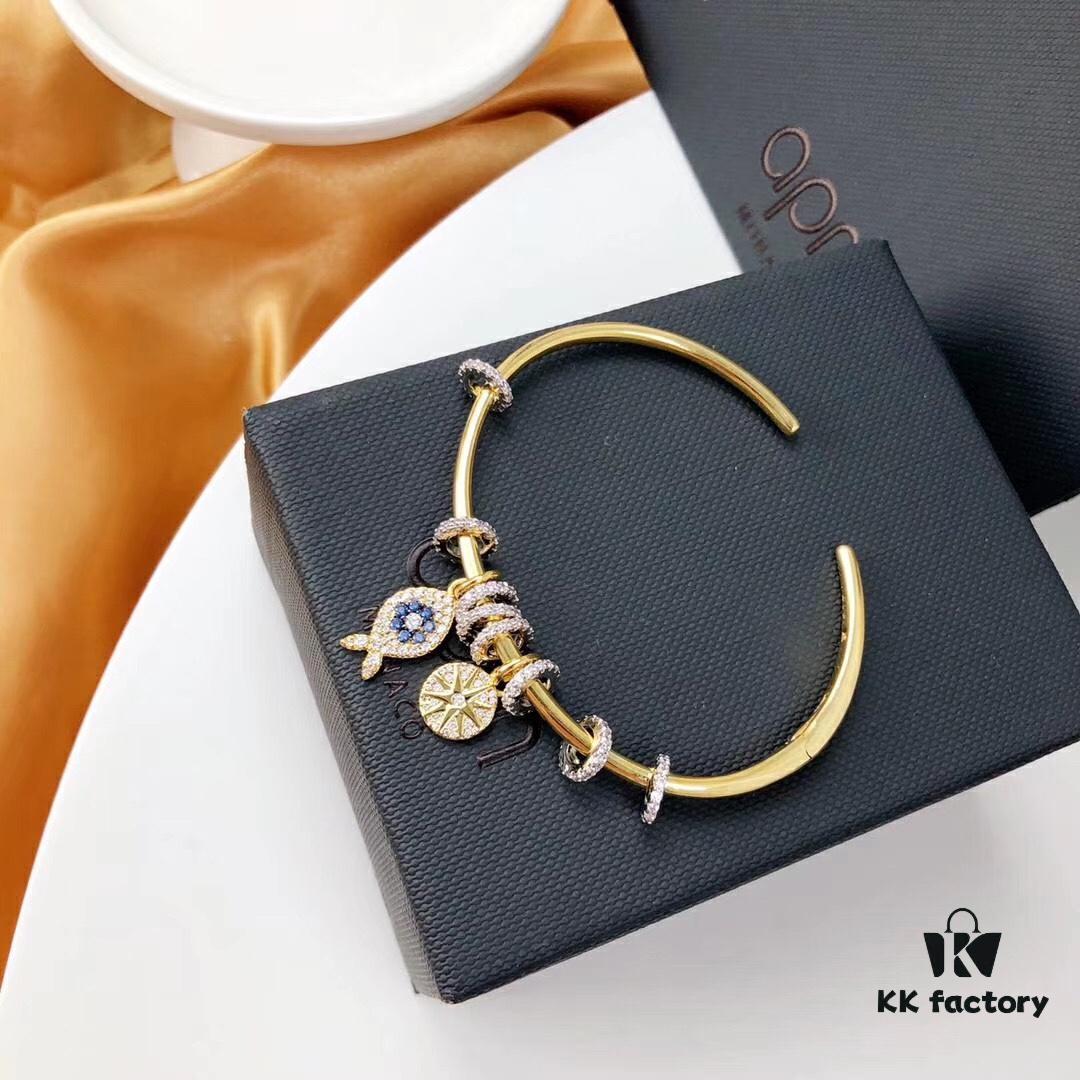 APM Monaco Lucky Little Fish Bracelet with Sliding Ring in Gold-Tone, Stylish and Unique Open Cuff Bangle Jewelry in Silver