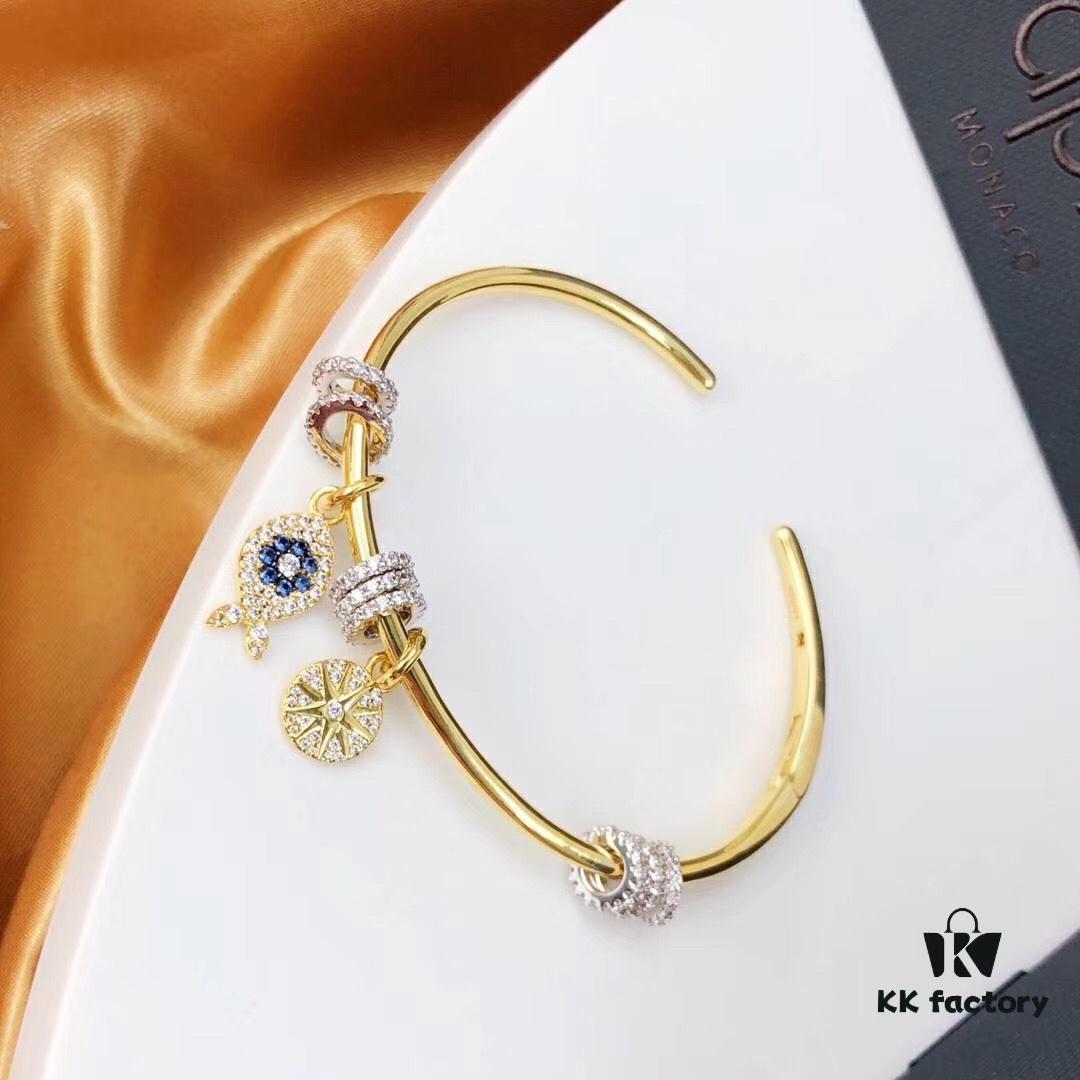 APM Monaco Lucky Little Fish Bracelet with Sliding Ring in Gold-Tone, Stylish and Unique Open Cuff Bangle Jewelry in Silver