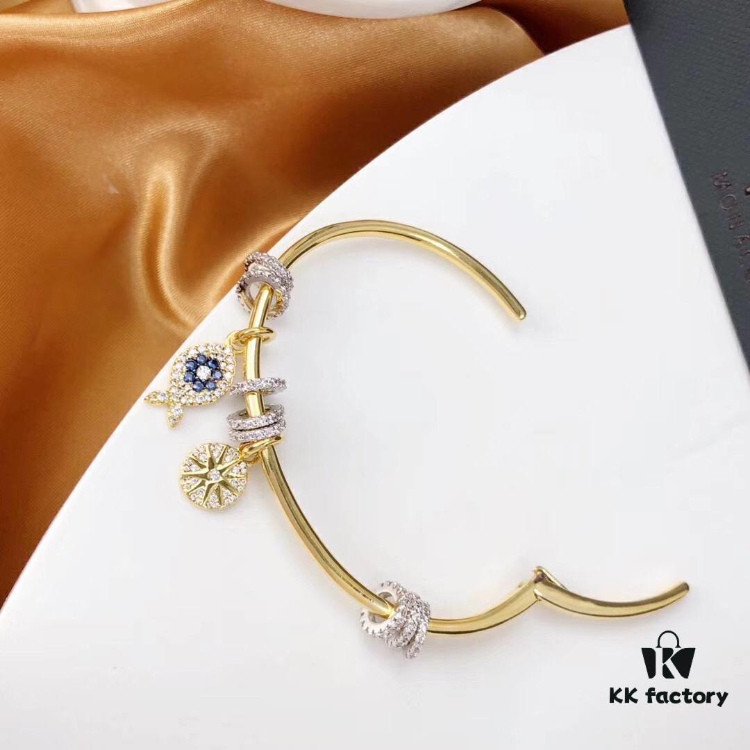 APM Monaco Lucky Little Fish Bracelet with Sliding Ring in Gold-Tone, Stylish and Unique Open Cuff Bangle Jewelry in Silver