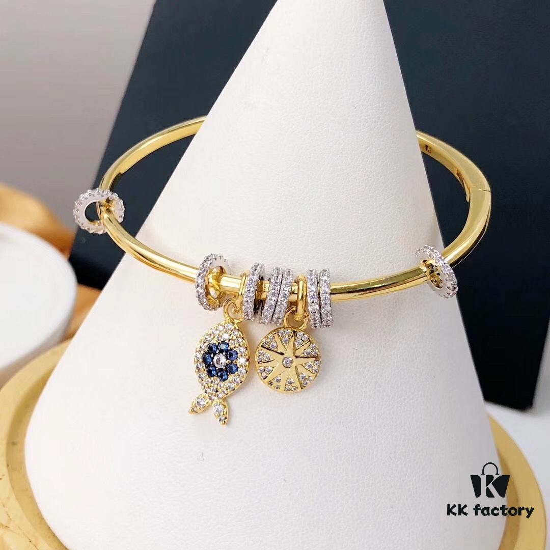 APM Monaco Lucky Little Fish Bracelet with Sliding Ring in Gold-Tone, Stylish and Unique Open Cuff Bangle Jewelry in Silver