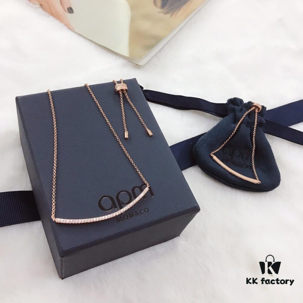 A Family Monaco Smile Pendant Necklace and Bracelet