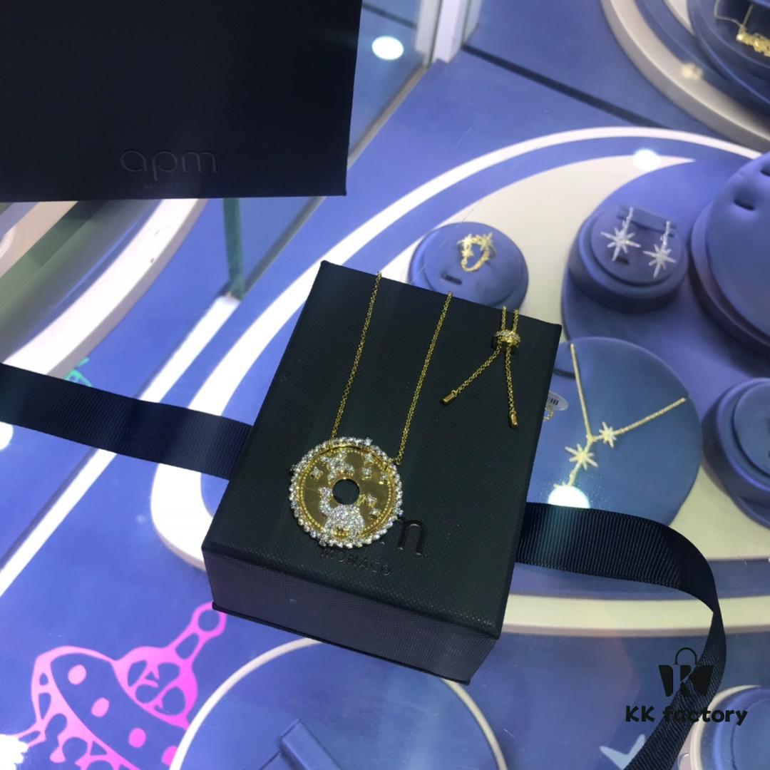 A Monaco Camel Round Pendant Necklace, Bracelet, Ring, and Earrings